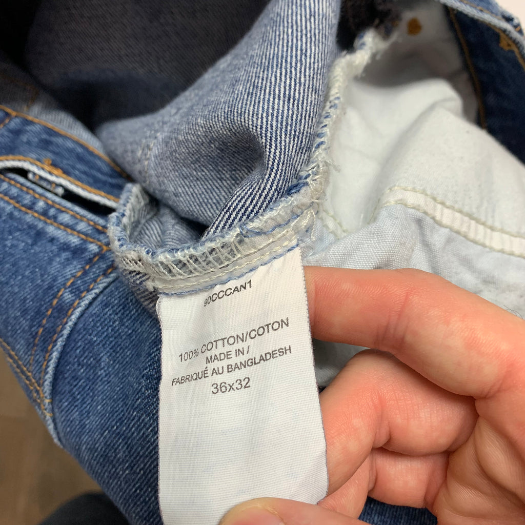 Vintage Medium Wash Levi’s Orange Tab 565 34x32