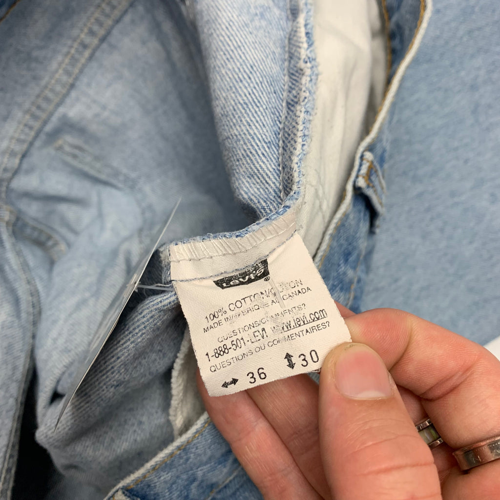 Levi’s Light Wash Orange Tabs 36