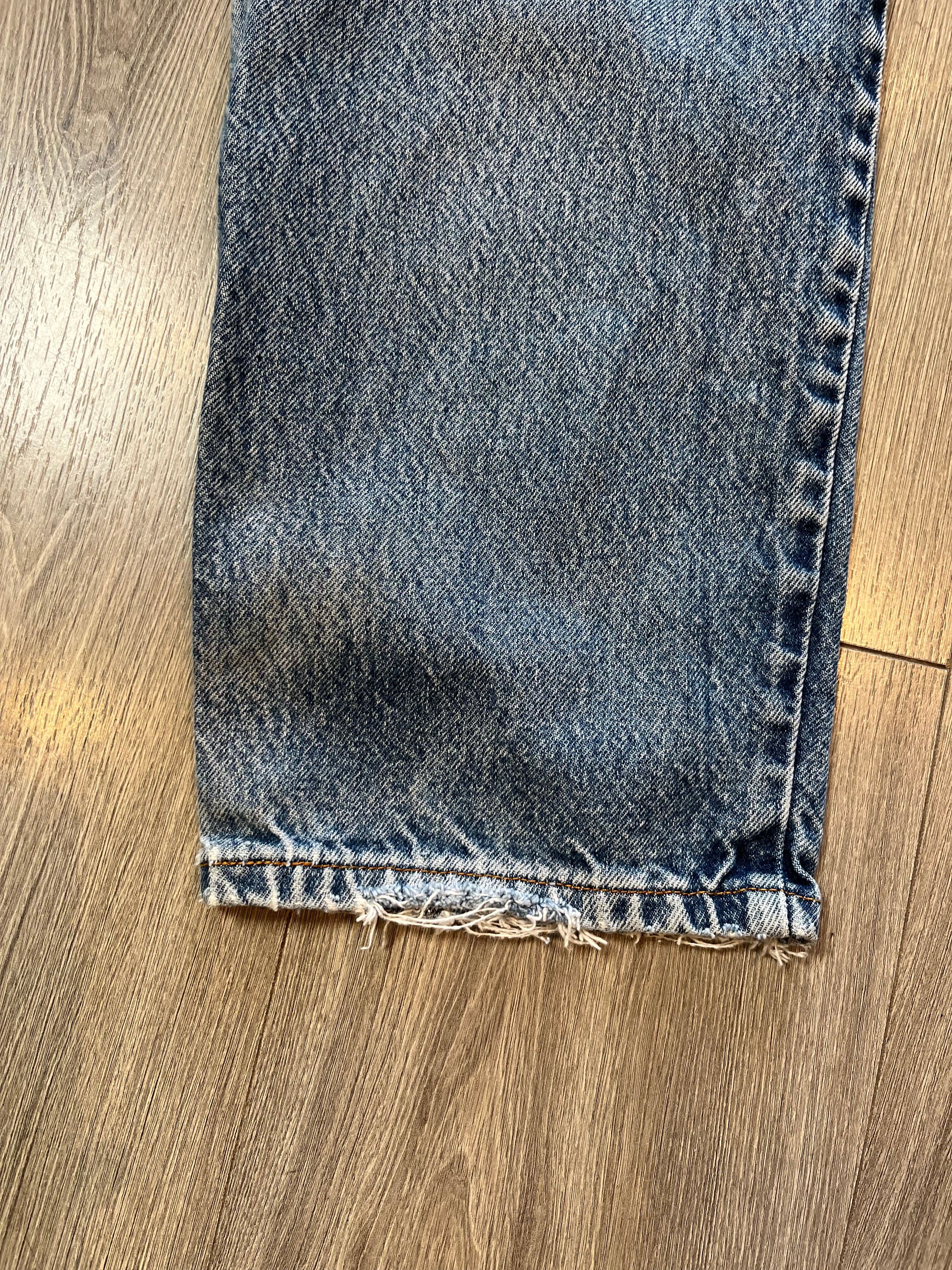 Vintage Levi's 550 Medium Wash Distressed Denim 31