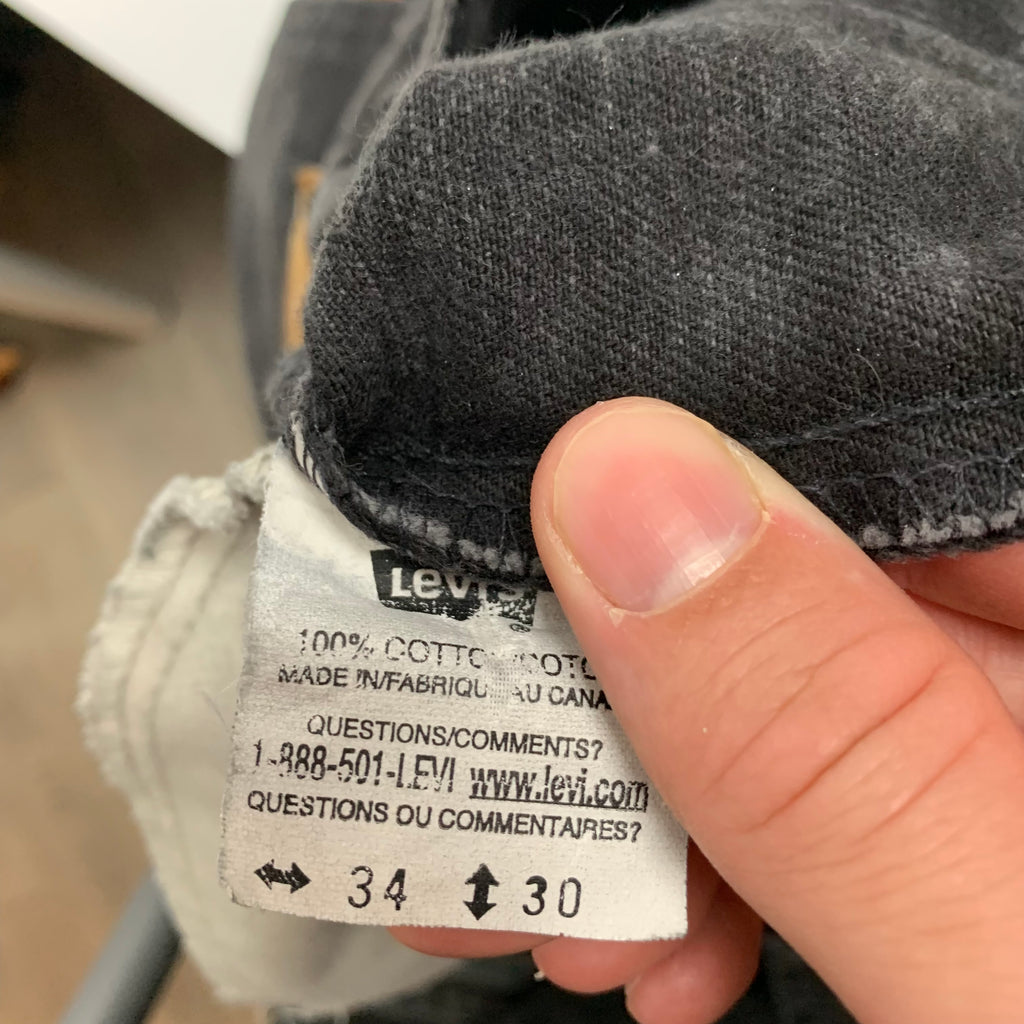 Vintage Black Levi’s Orange Tab 506 33x26