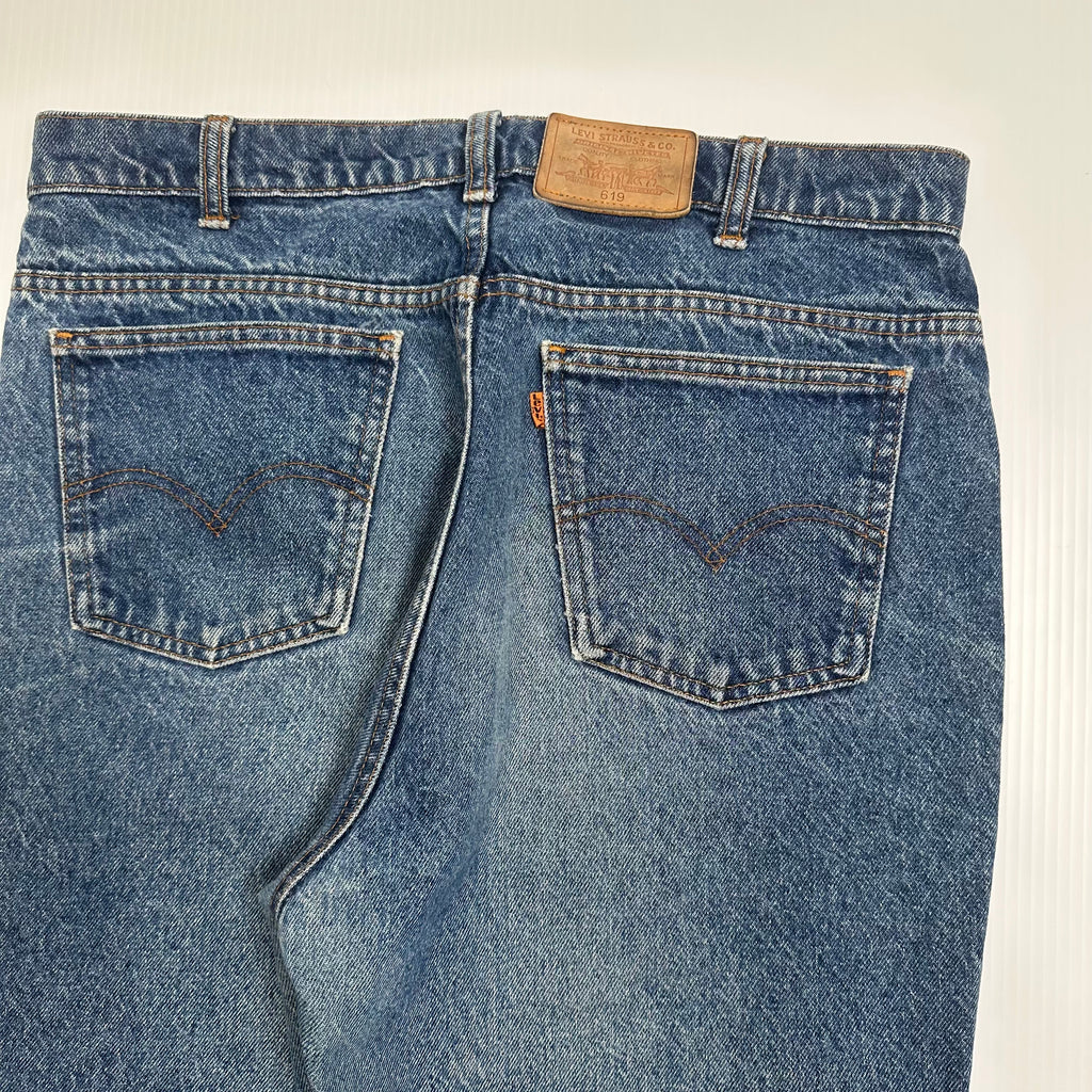 Vintage Levi's 619 Orange Tab Medium Wash Denim 36
