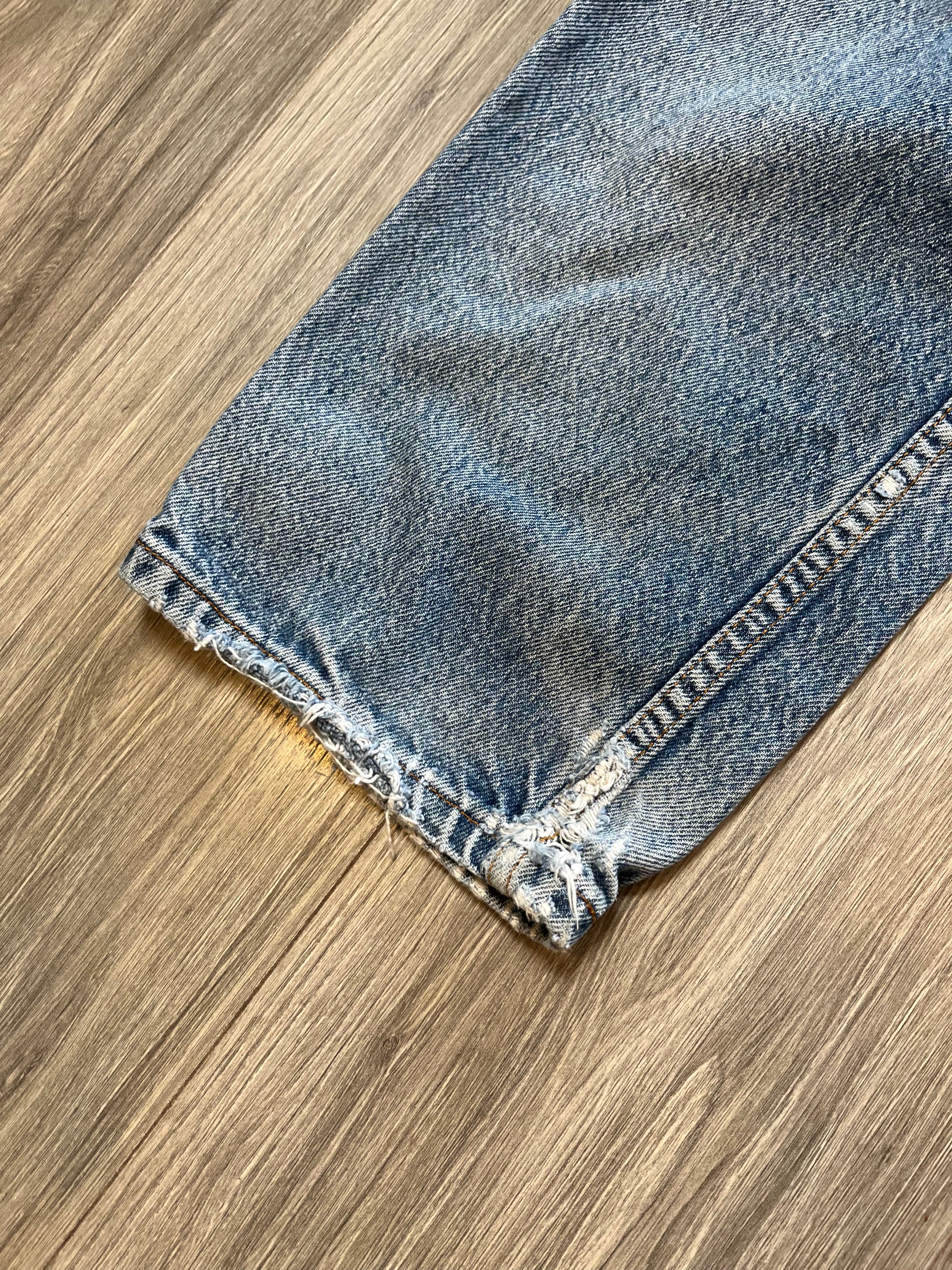Vintage Levi's 550 Medium Wash Distressed Denim 31