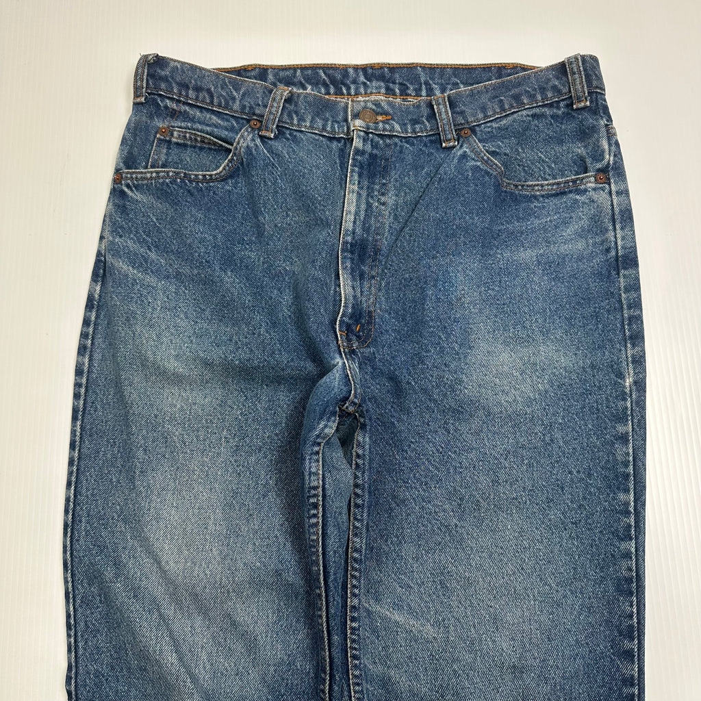 Vintage Levi's 619 Orange Tab Medium Wash Denim 36