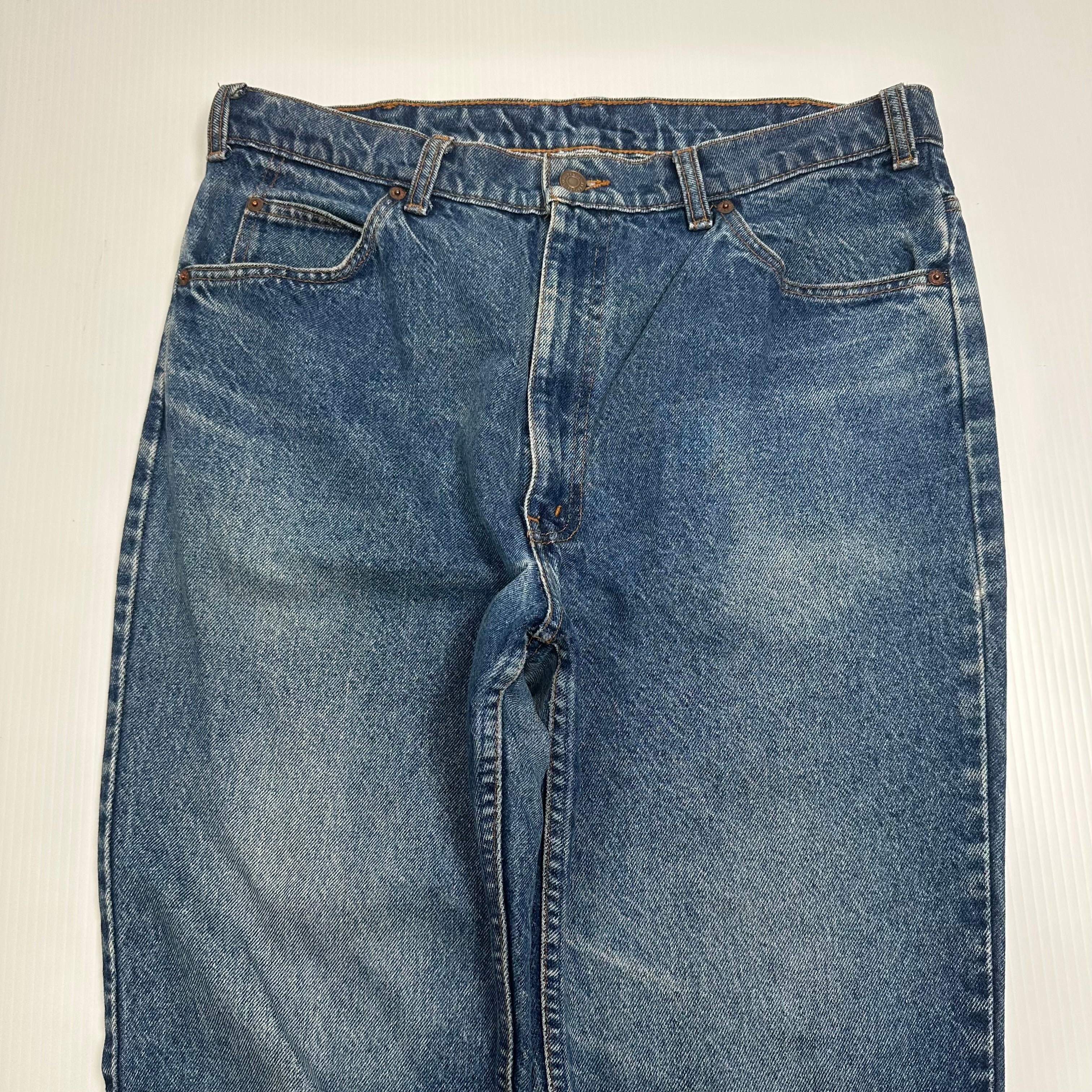 Vintage Levi's 619 Orange Tab Medium Wash Denim 36