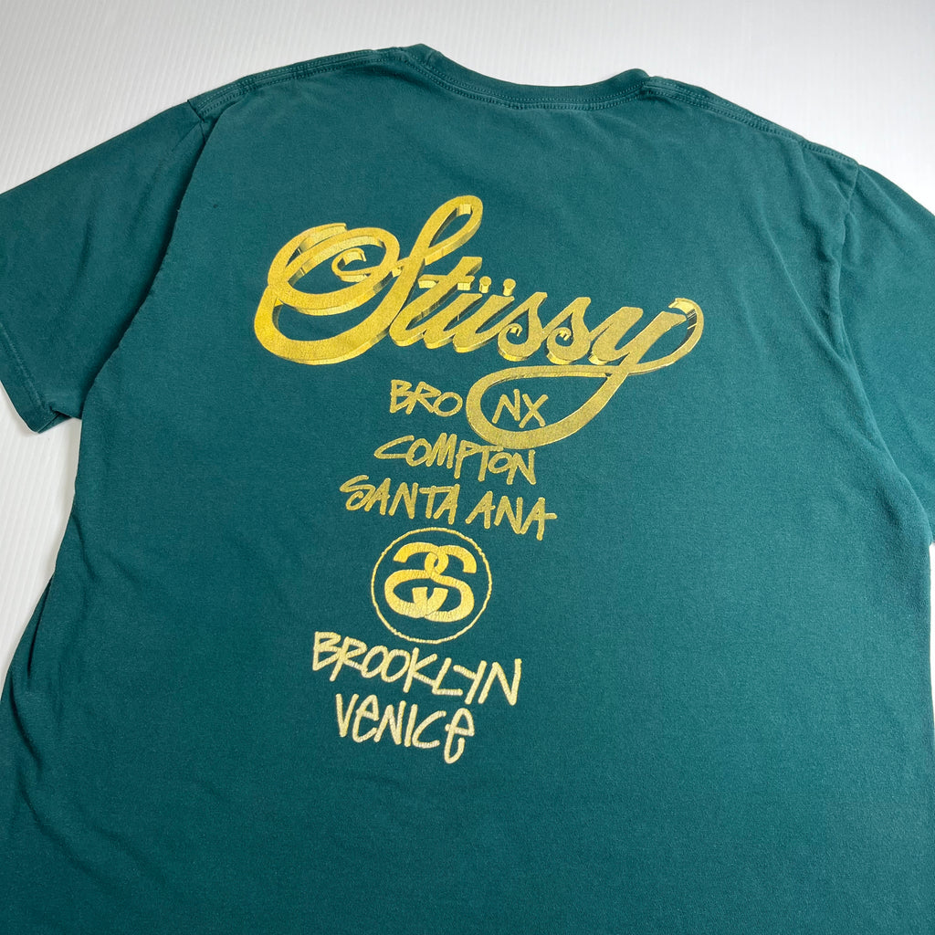 Stussy Gold Text Cities Graphic Tee L