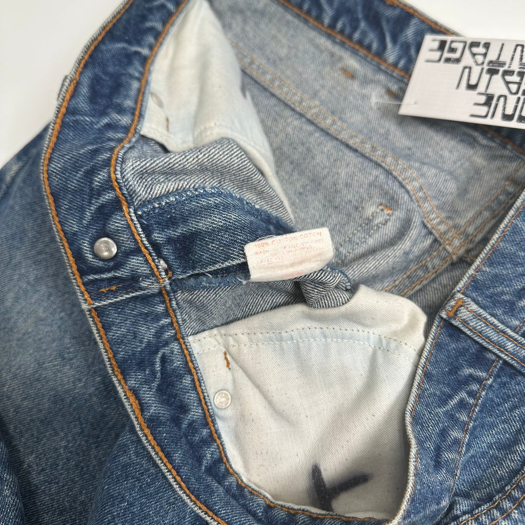 Vintage Levi's 619 Orange Tab Medium Wash Denim 36