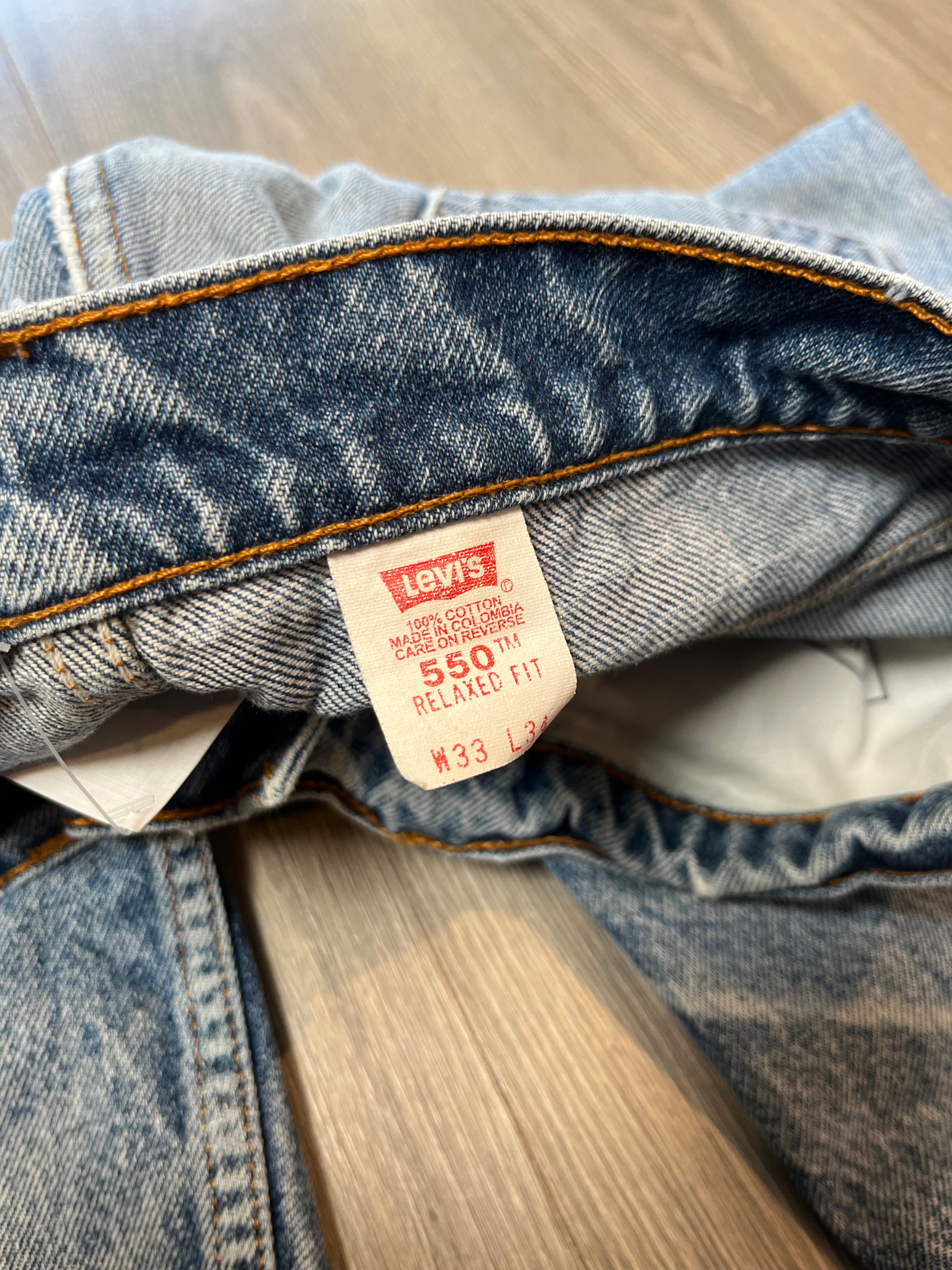 Vintage Levi's 550 Medium Wash Distressed Denim 31