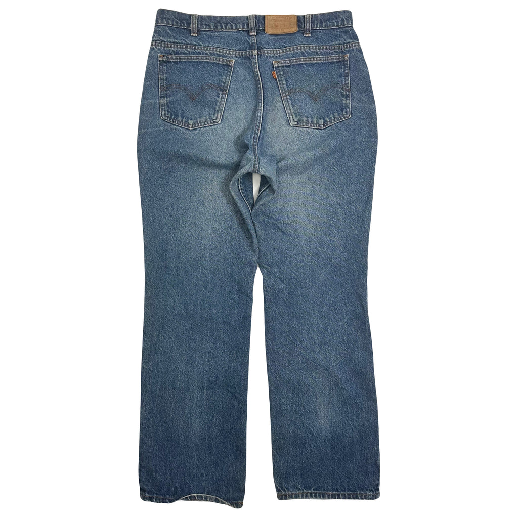 Vintage Levi's 619 Orange Tab Medium Wash Denim 36