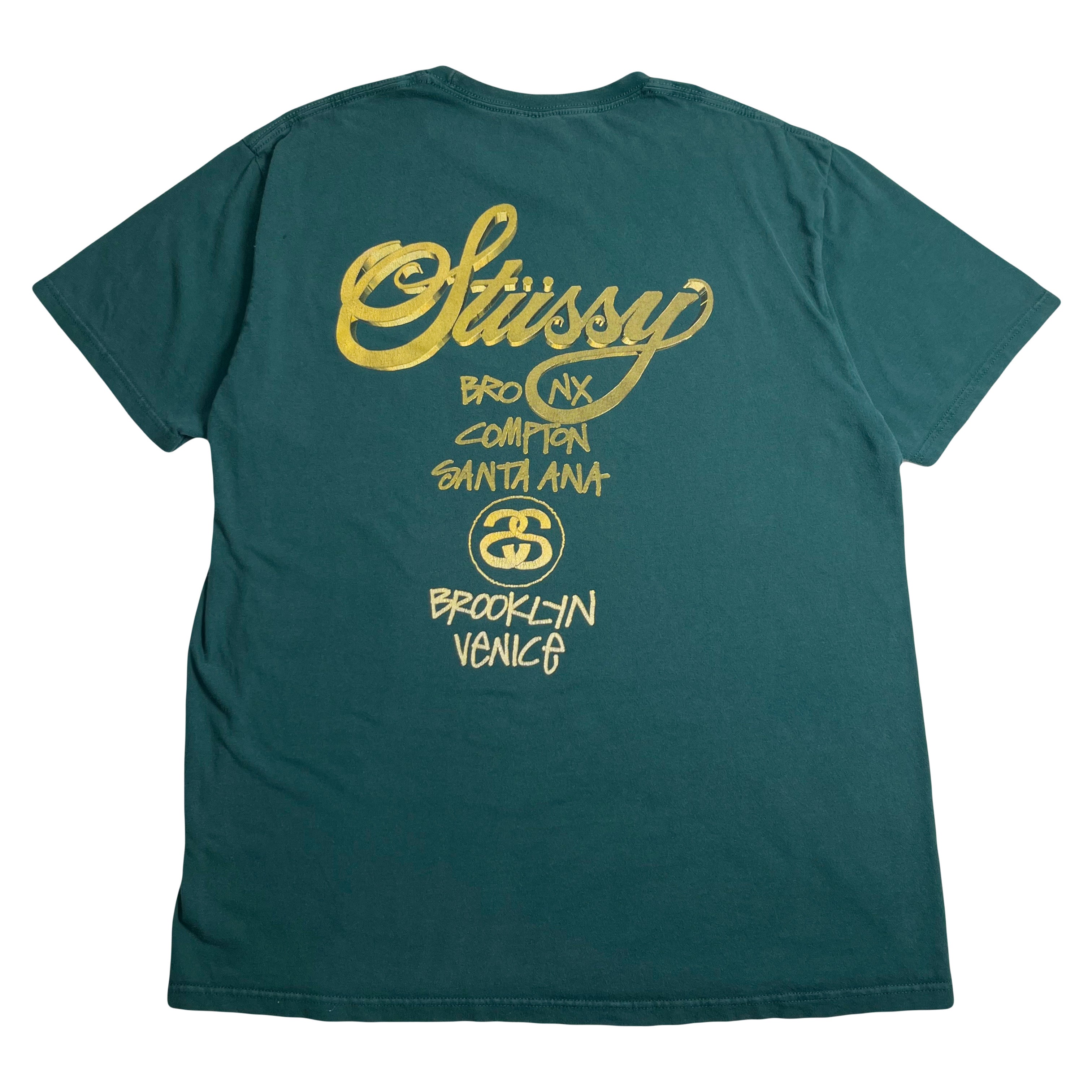 Stussy Gold Text Cities Graphic Tee L