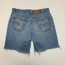 Load image into Gallery viewer, Levi’s Orange Tab Cutoffs 34
