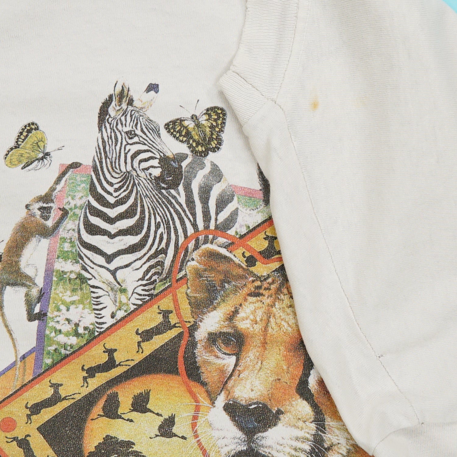 '90s Africa animal art collage tee L