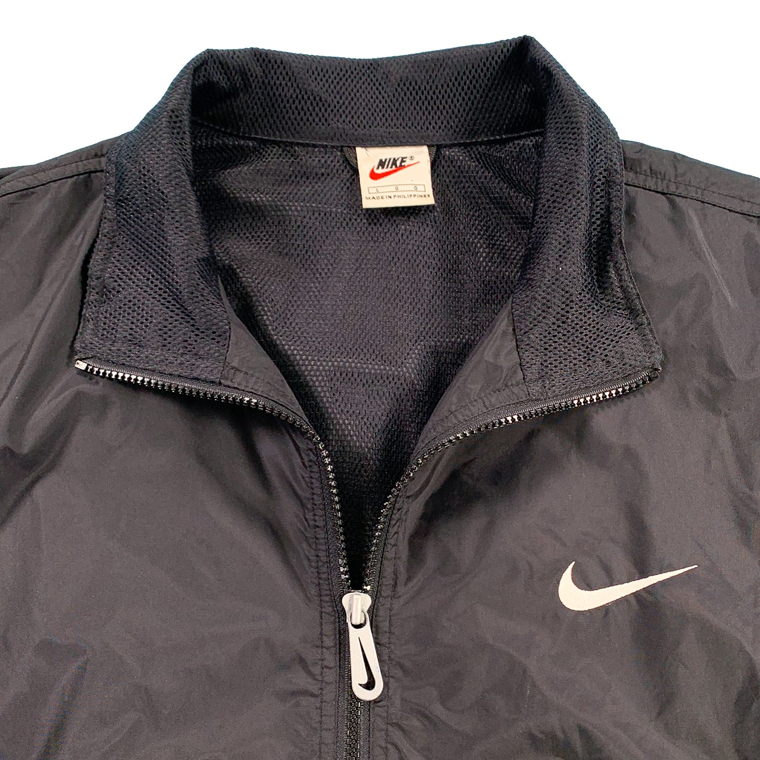 '90s Nike mini swoosh windbreaker L/XL
